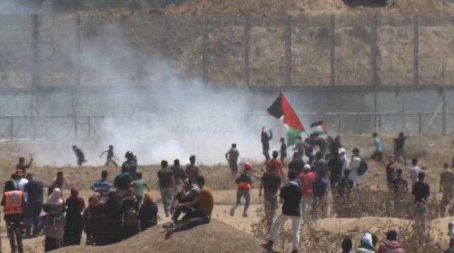 Thousands of Palestinians protest at the Israel border to mark Nakba