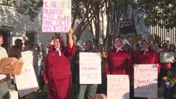 Alabama abortion advocates promise to fight back after controversial bill signed into law