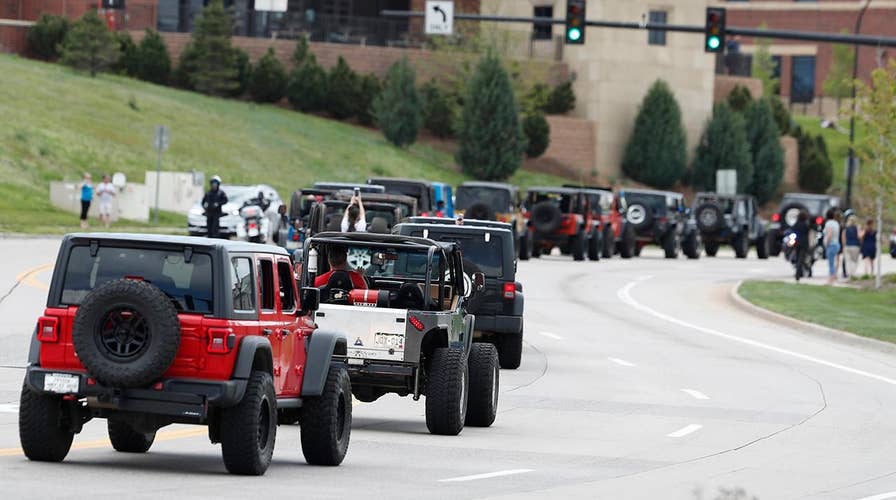 Procession of jeeps honors hero student