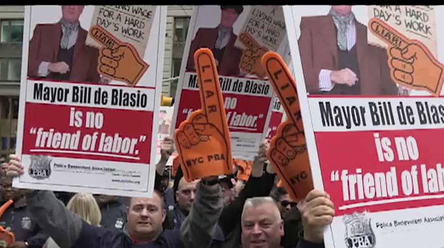 NYC Mayor Bill De Blasio faces protesters after announcing 2020 presidential bid