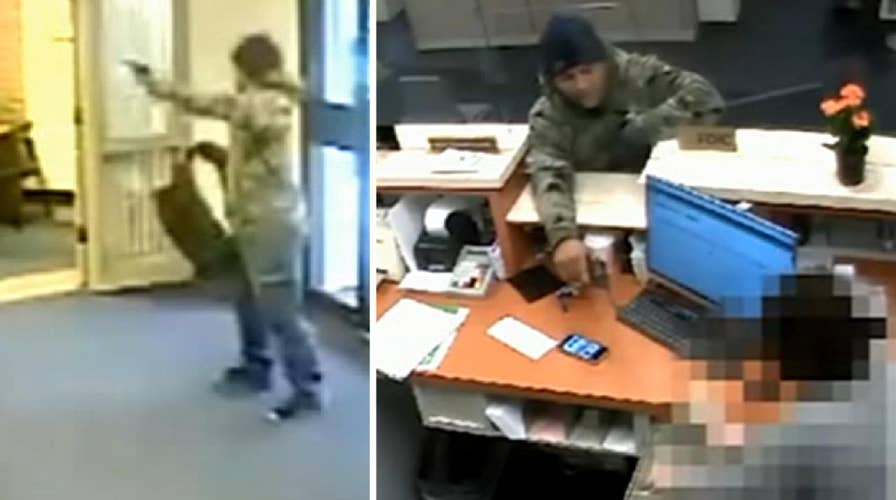 Armed suspect fires shots in violent bank robbery caught on surveillance camera