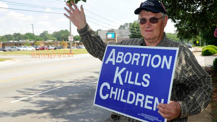 Media slam Alabama abortion law