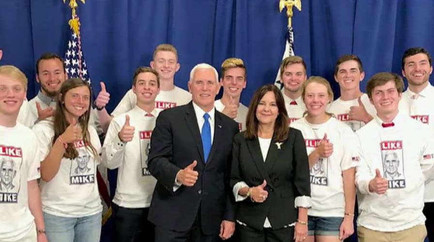 Vice President Mike Pence is met with protests and applause at Taylor University