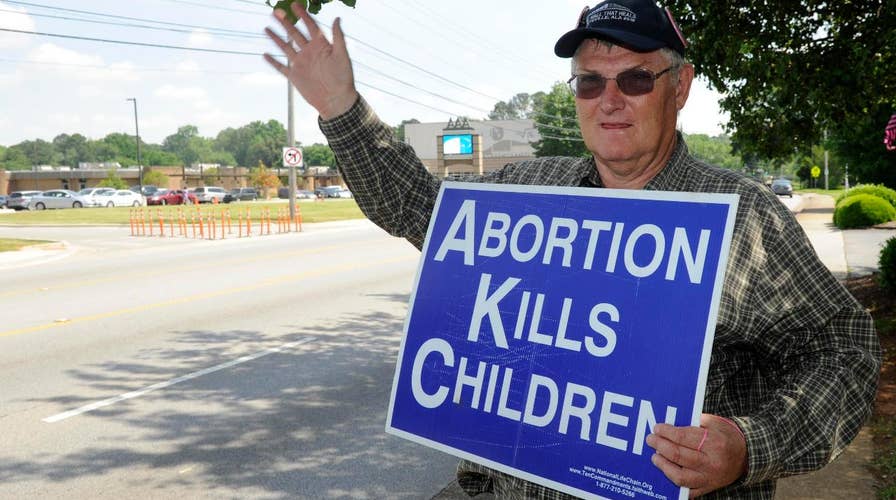 Media slam Alabama abortion law