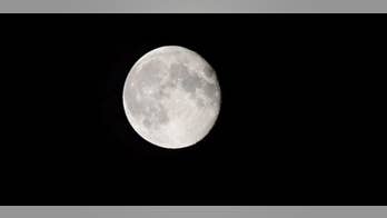 Astronomers spot moon ‘flashing at us’ and no one can explain why