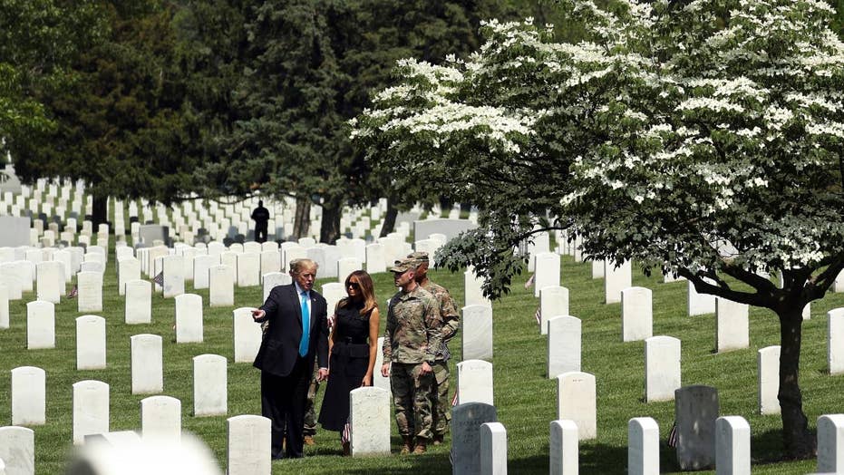 Trump pays respect to military dead at Arlington ahead of Memorial Day