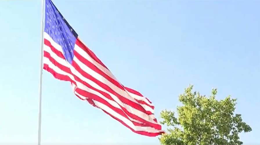 RV store sued by North Carolina city over massive American flag
