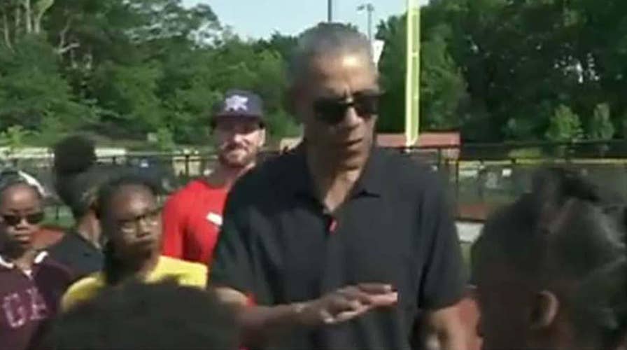 Former President Obama surprises young baseballs players at the Washington Nationals Youth Baseball Academy