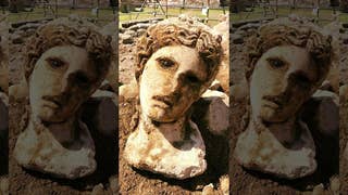 Ancient marble head depicting the Greek god Dionysus discovered in Rome - Fox News