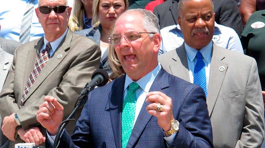 Democratic Louisiana governor defies party, plans to sign strict abortion ban into law