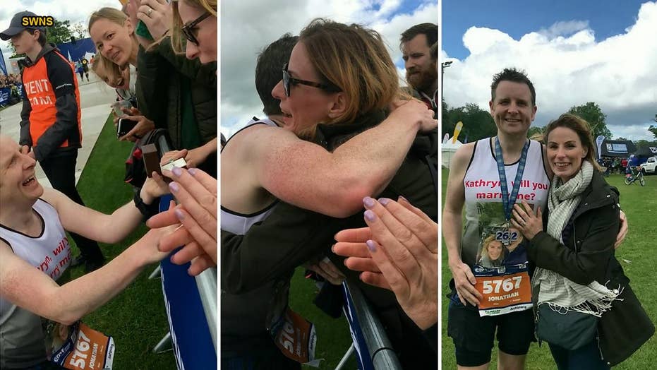 Marathon runner surprises girlfriend with proposal at finish line