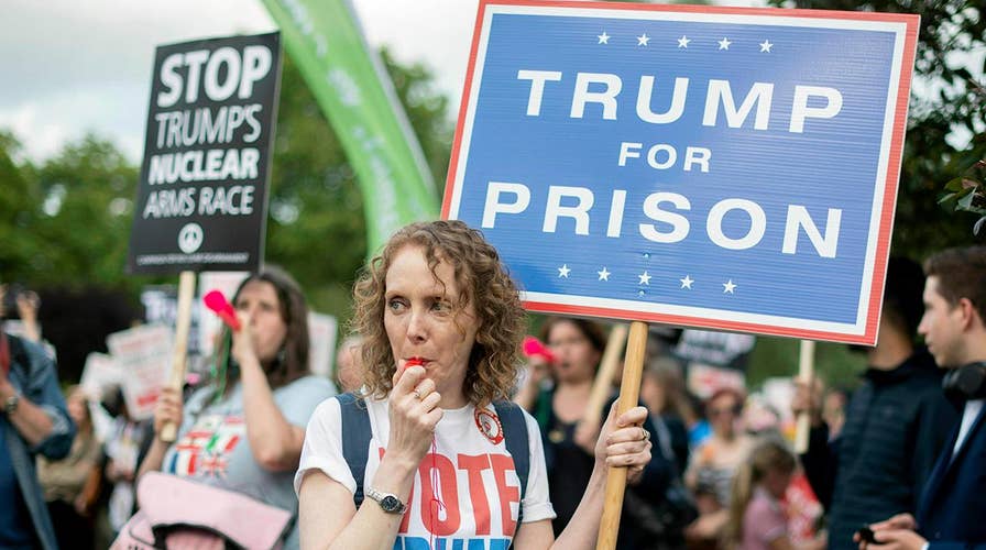 Anti-Trump protesters gather outside Buckingham Palace during Trump's UK visit