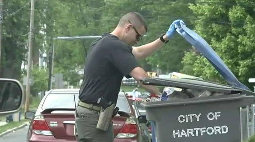 Connecticut investigators seen sifting through Hartford waste facility