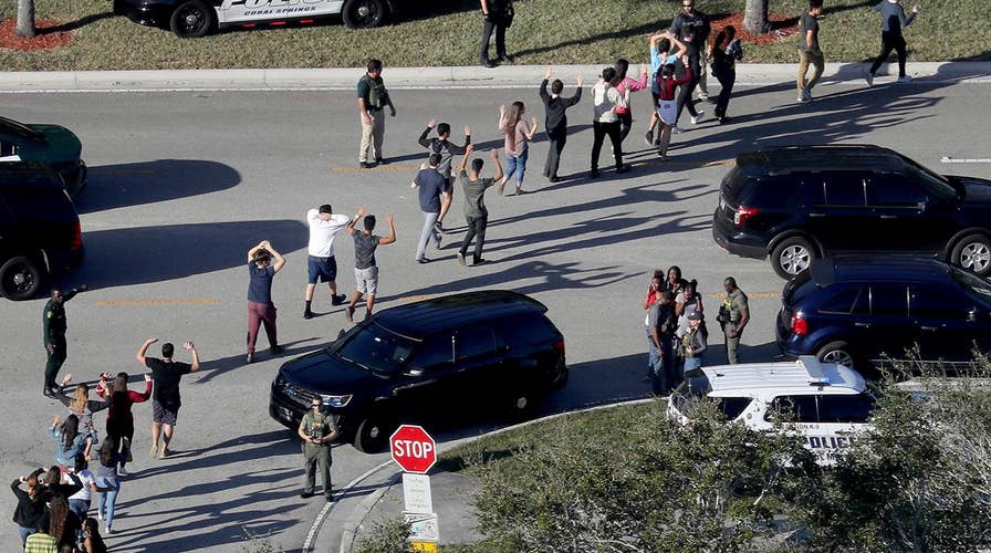 Former sheriff's deputy arrested over deadly school shooting in Parkland, Florida