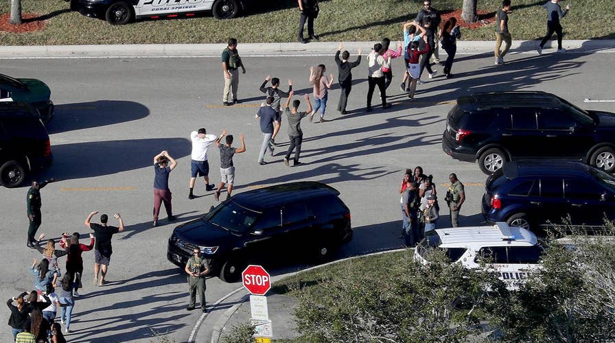 Former sheriff's deputy arrested over deadly school shooting in Parkland, Fla.