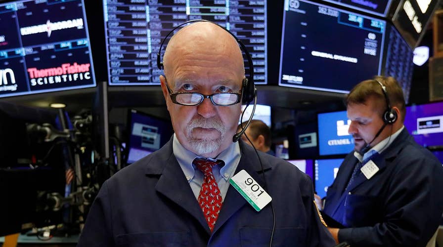 Stocks soar after Powell suggests Fed could cut rates