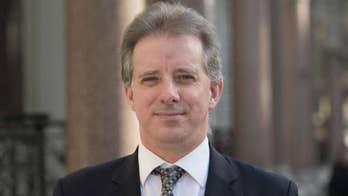 Christopher Steele's firm hits back at Trump, stands by dossier