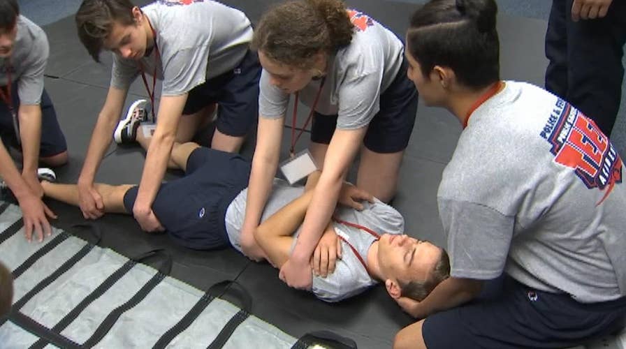 Summer camp gives teens hands-on experience in being a first responder