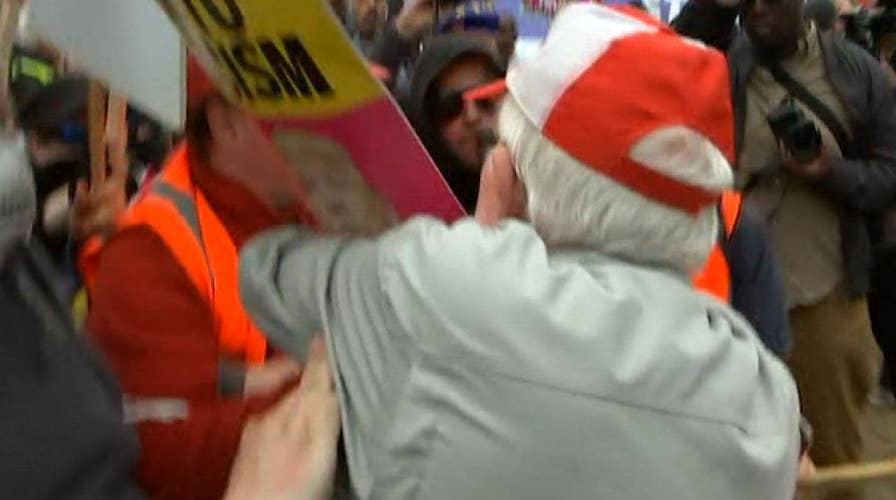 Trump supporter pushed to ground during anti-Trump protest in UK