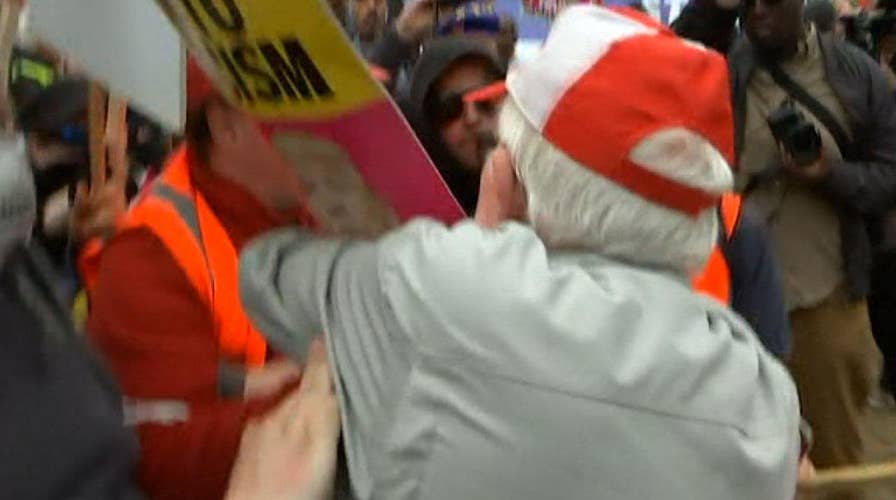 Trump supporter pushed to ground during anti-Trump protest in UK