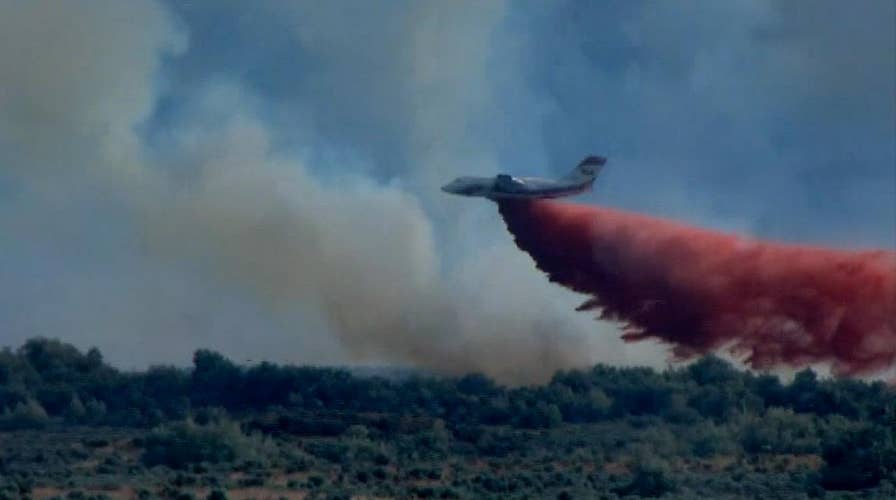 Crews battle to control wildfire in central Washington state