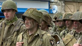D+1: Soldiers from 101st Airborne Division re-enlist at site of famous Battle of Carentan