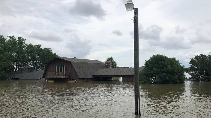 Arkansas residents assess historic flood damage