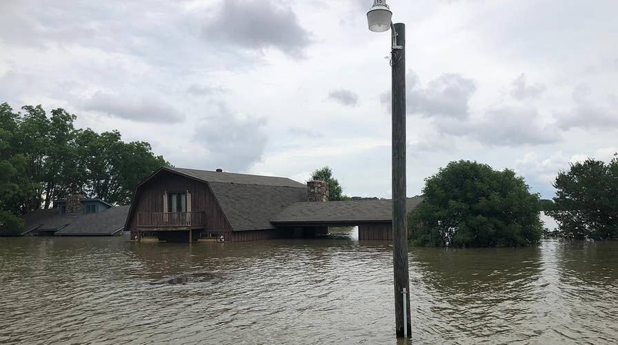 Arkansas residents assess historic flood damage