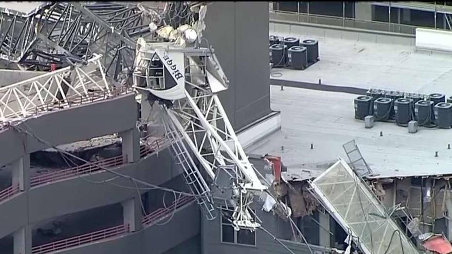 Crane collapses on Dallas apartment building amid strong winds; at