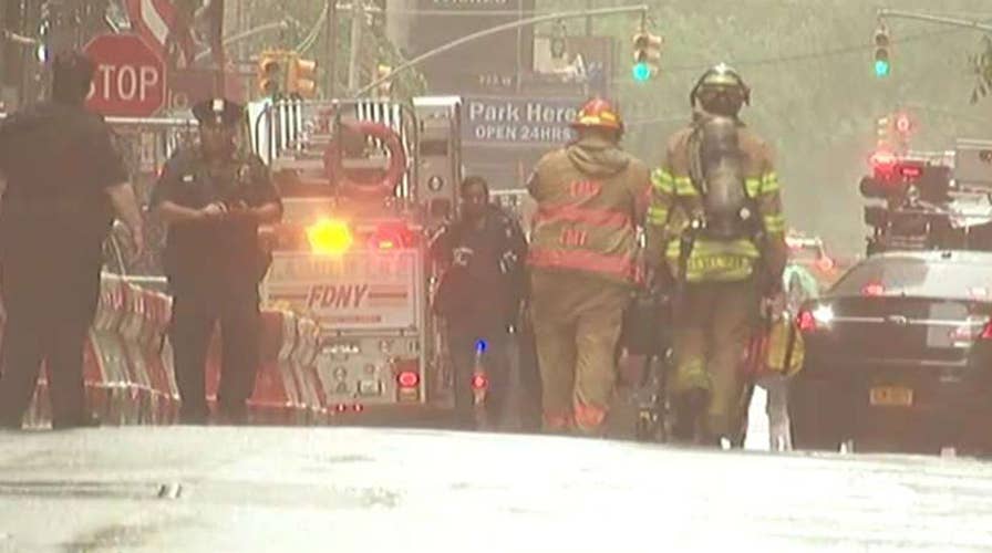 New York Fire Department responds to call of helicopter crash into building in midtown Manhattan