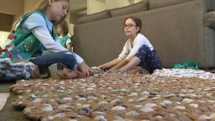 Girl Scouts in Georgia create eco-friendly sleeping mats for the homeless