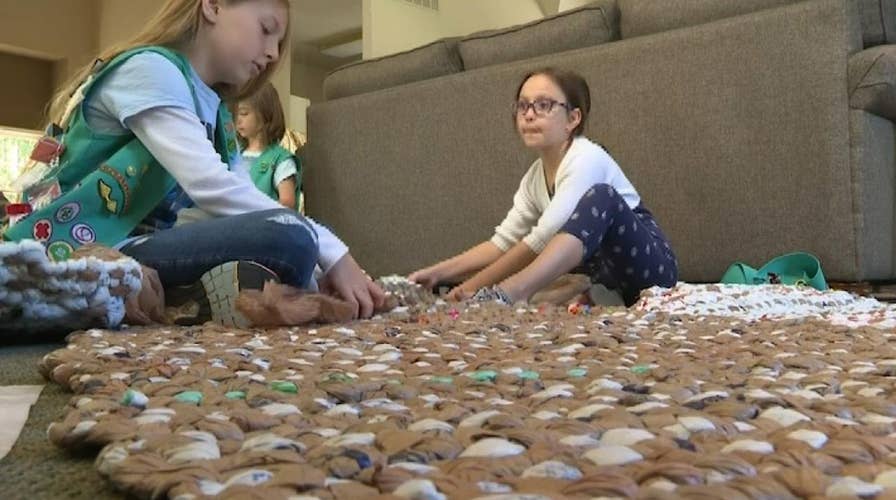 Girl Scouts in Georgia create eco-friendly sleeping mats for the homeless