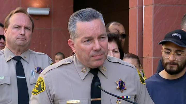 LA County Sheriff Alex Villanueva answers questions in a news conference on the shooting of a sheriff's deputy.