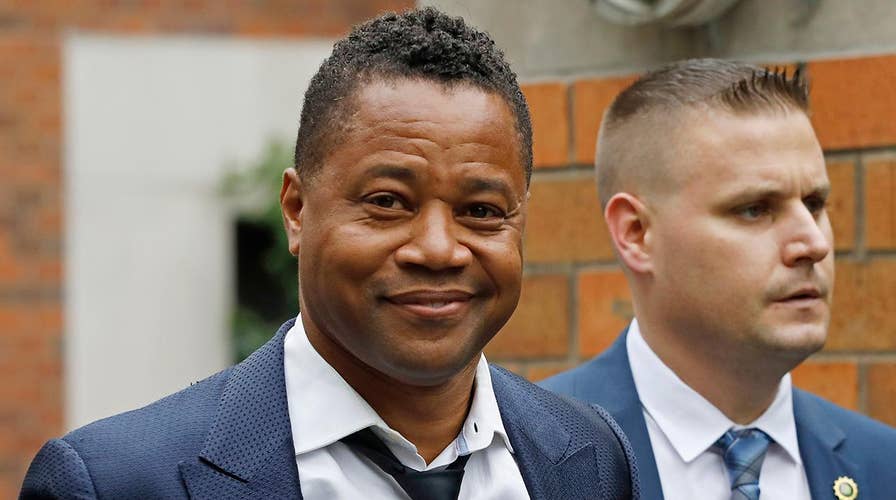 Cuba Gooding Jr. turns himself in to police after woman accuses him of groping her at New York City bar