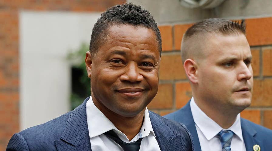 Cuba Gooding Jr. turns himself in to police after woman accuses him of groping her at New York City bar