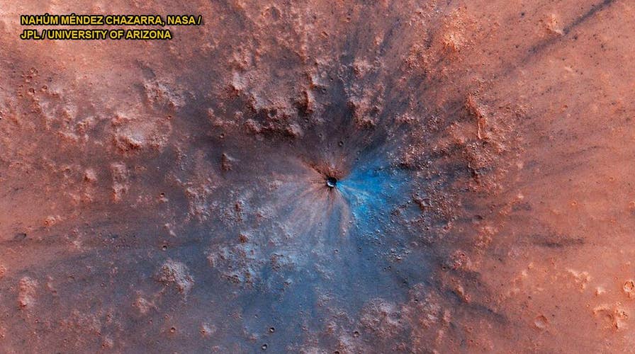 Impact crater on Mars exposes mysterious material