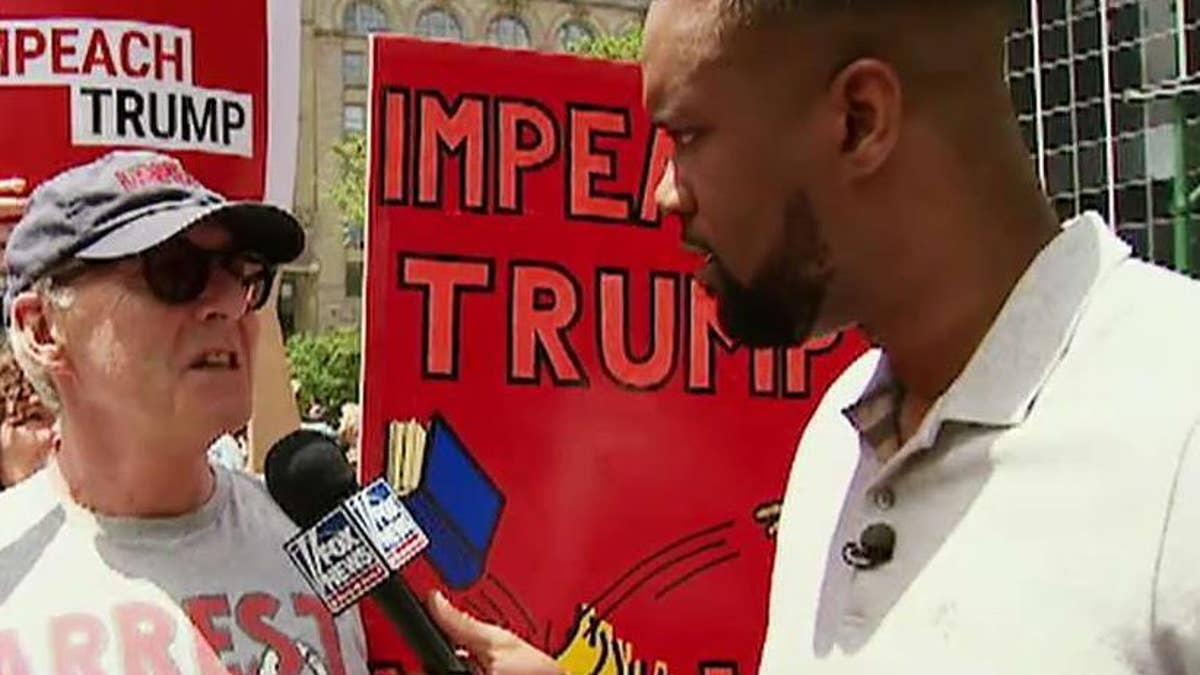 Fox News contributor Lawrence Jones faces racist taunts from protesters at  'Impeach Trump' rally | Fox News