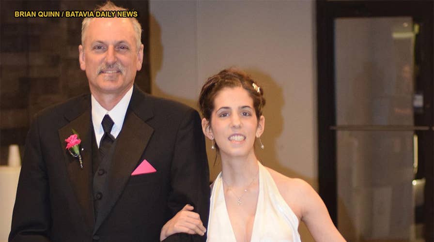 Father of teen with autism praised for taking his daughter to prom