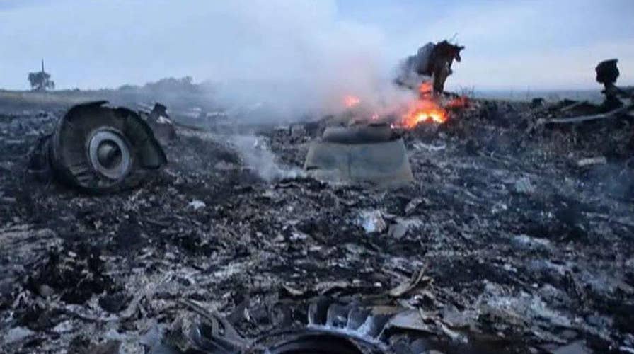Three Russians, one Ukrainian charged with murder over downing of MH17 flight
