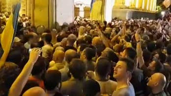 Protesters storm parliament building in Georgia
