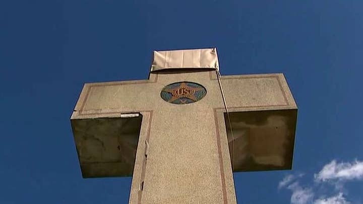 American Legion wins fight to keep peace cross memorial standing on public land
