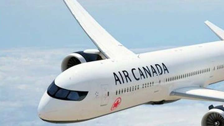 Woman wakes up locked in on Air Canada plane