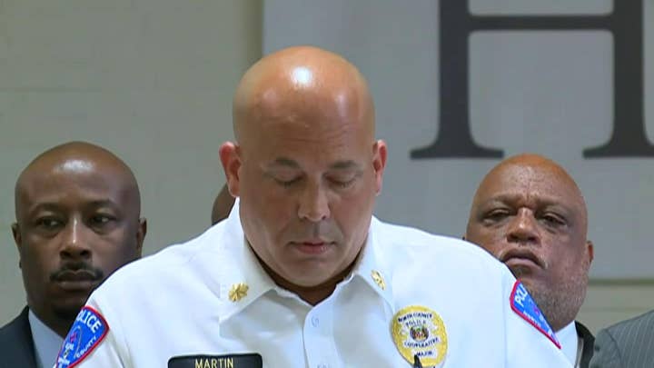 Police in Pine Lawn, Missouri hold a press conference on the fatal shooting of a North St. Louis County officer