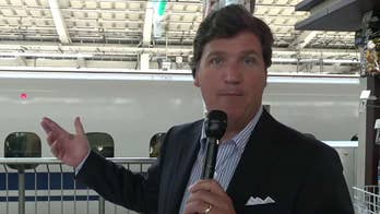 Tucker checks out a bullet train on his way from Tokyo to Kyoto