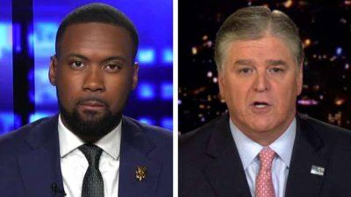 Lawrence Jones talks to Democratic debate attendees