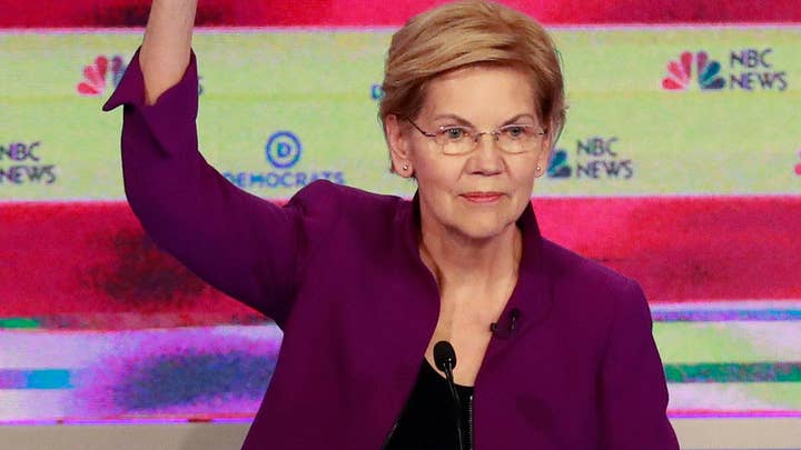 Sen. Elizabeth Warren reiterates support to end private insurance during debate