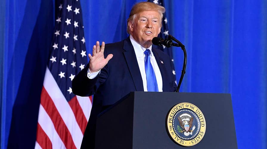 A handshake… or slap for Kim Jong Un?