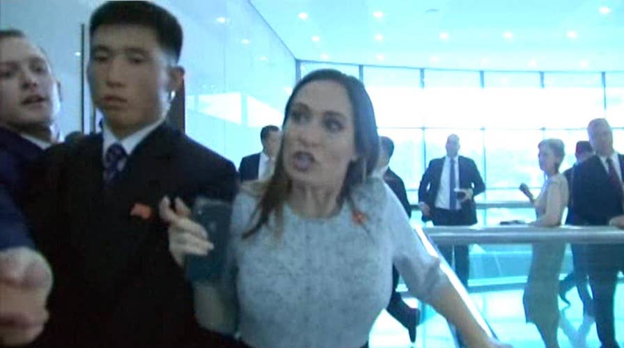 White House press secretary Stephanie Grisham caught in scuffle with North Korean guards