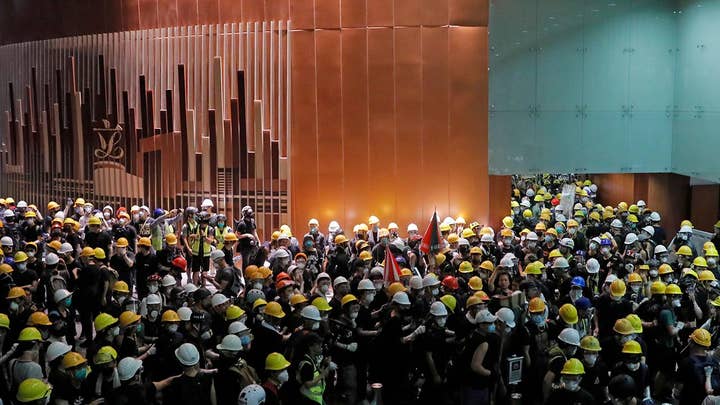 Hong Kong police investigating crime scene after protesters ransack parliament building