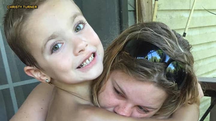 Georgia boy, 7, saves 20-year-old sister after she had seizure in pool